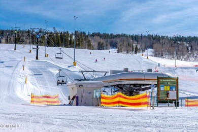 Desirable top floor mountain getaway in Aspen Meadows with full on Headwaters Golf Course At Granby Ranch in Colorado - for sale on GolfHomes.com, golf home, golf lot