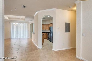 Resort-style living meets everyday convenience in this 1,278 sq on The Palencia Club in Florida - for sale on GolfHomes.com, golf home, golf lot