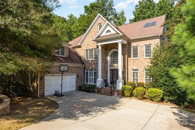Welcome to this exquisite 7-bedroom, 6-bathroom residence on The Palisades Country Club in North Carolina - for sale on GolfHomes.com, golf home, golf lot