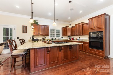 Welcome to this exquisite 7-bedroom, 6-bathroom residence on The Palisades Country Club in North Carolina - for sale on GolfHomes.com, golf home, golf lot