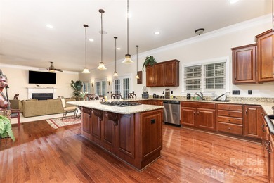 Welcome to this exquisite 7-bedroom, 6-bathroom residence on The Palisades Country Club in North Carolina - for sale on GolfHomes.com, golf home, golf lot