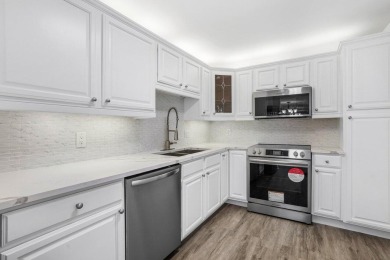 Nestled in a secluded tropical enclave of the Sandpiper section on Quail Ridge Golf Course and Country Club in Florida - for sale on GolfHomes.com, golf home, golf lot
