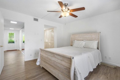 Nestled in a secluded tropical enclave of the Sandpiper section on Quail Ridge Golf Course and Country Club in Florida - for sale on GolfHomes.com, golf home, golf lot