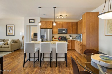 Welcome to this furnished 2-bedroom, 2-bathroom condo perched on on Headwaters Golf Course At Granby Ranch in Colorado - for sale on GolfHomes.com, golf home, golf lot