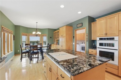 Perched at the top of a hill, this Victoria home offers peaceful on Deer Run Golf Club in Minnesota - for sale on GolfHomes.com, golf home, golf lot