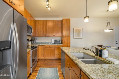 Welcome to this furnished 2-bedroom, 2-bathroom condo perched on on Headwaters Golf Course At Granby Ranch in Colorado - for sale on GolfHomes.com, golf home, golf lot