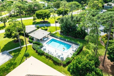 Nestled in a secluded tropical enclave of the Sandpiper section on Quail Ridge Golf Course and Country Club in Florida - for sale on GolfHomes.com, golf home, golf lot