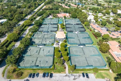 Nestled in a secluded tropical enclave of the Sandpiper section on Quail Ridge Golf Course and Country Club in Florida - for sale on GolfHomes.com, golf home, golf lot