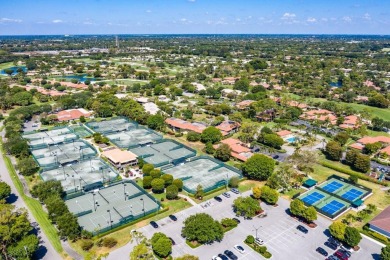 Nestled in a secluded tropical enclave of the Sandpiper section on Quail Ridge Golf Course and Country Club in Florida - for sale on GolfHomes.com, golf home, golf lot