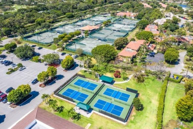 Nestled in a secluded tropical enclave of the Sandpiper section on Quail Ridge Golf Course and Country Club in Florida - for sale on GolfHomes.com, golf home, golf lot