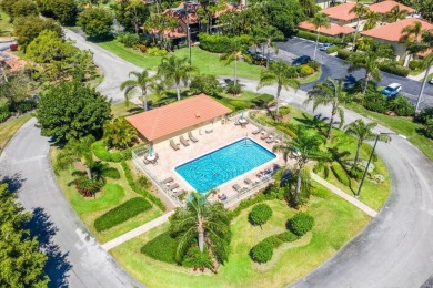 Nestled in a secluded tropical enclave of the Sandpiper section on Quail Ridge Golf Course and Country Club in Florida - for sale on GolfHomes.com, golf home, golf lot