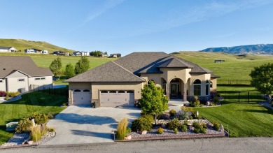 Luxury, comfort, and captivating views come together in this on The Powder Horn Golf Club - Mountain in Wyoming - for sale on GolfHomes.com, golf home, golf lot