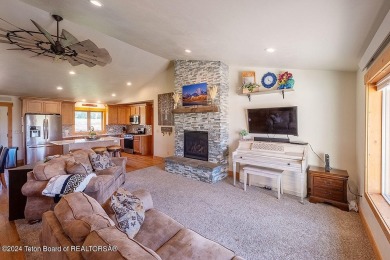 This well-maintained home in beautiful Star Valley Ranch, is all on Star Valley RV Golf Course in Wyoming - for sale on GolfHomes.com, golf home, golf lot