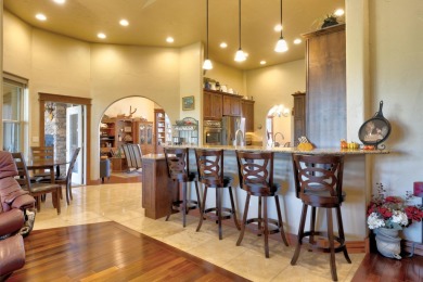 Luxury, comfort, and captivating views come together in this on The Powder Horn Golf Club - Mountain in Wyoming - for sale on GolfHomes.com, golf home, golf lot
