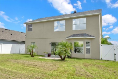 Welcome to this spacious and well-appointed two-story home on Remington Golf Club in Florida - for sale on GolfHomes.com, golf home, golf lot