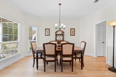 Experience Modern Coastal Living in Gulf Breeze! Discover the on Tiger Point Golf and Country Club in Florida - for sale on GolfHomes.com, golf home, golf lot