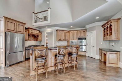 Stunning 5 bed/5.5 bath MASTER-ON-MAIN, 4-side BRICK home with on Laurel Springs Golf Club in Georgia - for sale on GolfHomes.com, golf home, golf lot