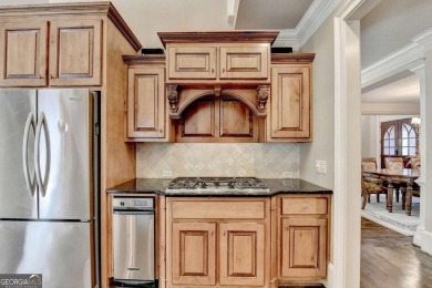 Stunning 5 bed/5.5 bath MASTER-ON-MAIN, 4-side BRICK home with on Laurel Springs Golf Club in Georgia - for sale on GolfHomes.com, golf home, golf lot