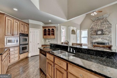 Stunning 5 bed/5.5 bath MASTER-ON-MAIN, 4-side BRICK home with on Laurel Springs Golf Club in Georgia - for sale on GolfHomes.com, golf home, golf lot