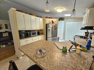 Please note; buyers do not own the land. This 2-bedroom, 2 bath on Big Cypress Golf and Country Club in Florida - for sale on GolfHomes.com, golf home, golf lot