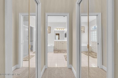 The epitome of luxurious, country club living, nestled within on Country Club of Orange Park in Florida - for sale on GolfHomes.com, golf home, golf lot