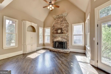 Stunning 5 bed/5.5 bath MASTER-ON-MAIN, 4-side BRICK home with on Laurel Springs Golf Club in Georgia - for sale on GolfHomes.com, golf home, golf lot