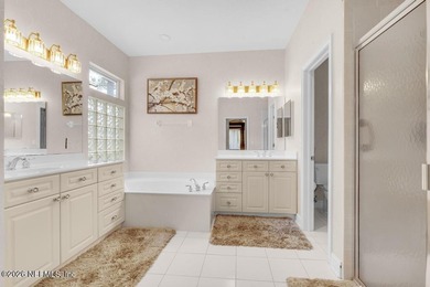 The epitome of luxurious, country club living, nestled within on Country Club of Orange Park in Florida - for sale on GolfHomes.com, golf home, golf lot