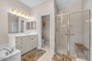 The epitome of luxurious, country club living, nestled within on Country Club of Orange Park in Florida - for sale on GolfHomes.com, golf home, golf lot