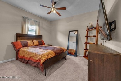 The epitome of luxurious, country club living, nestled within on Country Club of Orange Park in Florida - for sale on GolfHomes.com, golf home, golf lot