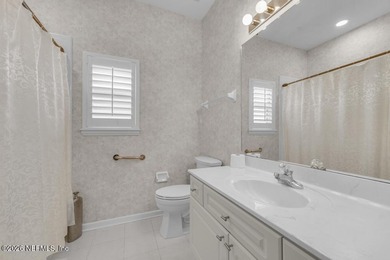 The epitome of luxurious, country club living, nestled within on Country Club of Orange Park in Florida - for sale on GolfHomes.com, golf home, golf lot