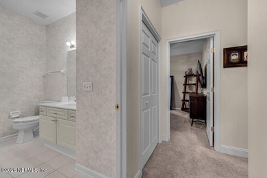 The epitome of luxurious, country club living, nestled within on Country Club of Orange Park in Florida - for sale on GolfHomes.com, golf home, golf lot