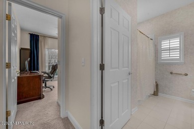 The epitome of luxurious, country club living, nestled within on Country Club of Orange Park in Florida - for sale on GolfHomes.com, golf home, golf lot