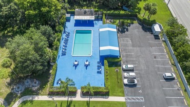 Welcome to this beautifully upgraded true corner unit in the on Poinciana Golf Club in Florida - for sale on GolfHomes.com, golf home, golf lot