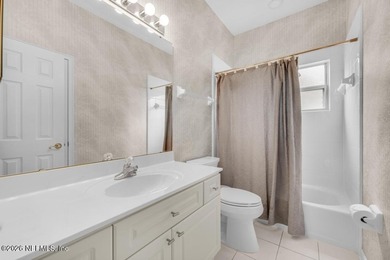 The epitome of luxurious, country club living, nestled within on Country Club of Orange Park in Florida - for sale on GolfHomes.com, golf home, golf lot