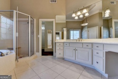Stunning 5 bed/5.5 bath MASTER-ON-MAIN, 4-side BRICK home with on Laurel Springs Golf Club in Georgia - for sale on GolfHomes.com, golf home, golf lot