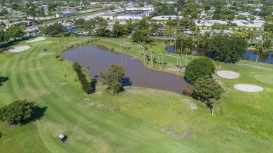 Welcome to this beautifully upgraded true corner unit in the on Poinciana Golf Club in Florida - for sale on GolfHomes.com, golf home, golf lot