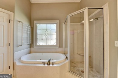 Stunning 5 bed/5.5 bath MASTER-ON-MAIN, 4-side BRICK home with on Laurel Springs Golf Club in Georgia - for sale on GolfHomes.com, golf home, golf lot