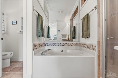 Experience Modern Coastal Living in Gulf Breeze! Discover the on Tiger Point Golf and Country Club in Florida - for sale on GolfHomes.com, golf home, golf lot