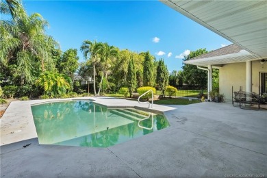 ired of seeing the same cookie-cutter homes? This custom 3BR/3BA on The Saints At Port St Lucie Golf Course in Florida - for sale on GolfHomes.com, golf home, golf lot