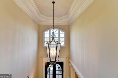 Stunning 5 bed/5.5 bath MASTER-ON-MAIN, 4-side BRICK home with on Laurel Springs Golf Club in Georgia - for sale on GolfHomes.com, golf home, golf lot