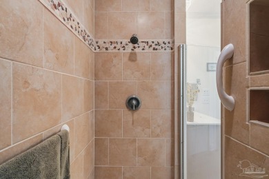 Experience Modern Coastal Living in Gulf Breeze! Discover the on Tiger Point Golf and Country Club in Florida - for sale on GolfHomes.com, golf home, golf lot