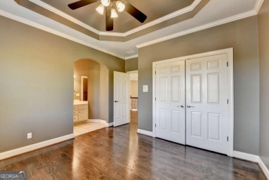 Stunning 5 bed/5.5 bath MASTER-ON-MAIN, 4-side BRICK home with on Laurel Springs Golf Club in Georgia - for sale on GolfHomes.com, golf home, golf lot
