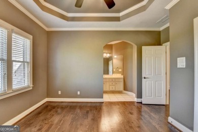 Stunning 5 bed/5.5 bath MASTER-ON-MAIN, 4-side BRICK home with on Laurel Springs Golf Club in Georgia - for sale on GolfHomes.com, golf home, golf lot