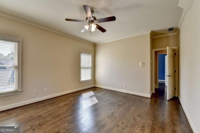 Stunning 5 bed/5.5 bath MASTER-ON-MAIN, 4-side BRICK home with on Laurel Springs Golf Club in Georgia - for sale on GolfHomes.com, golf home, golf lot
