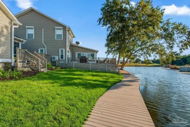 Experience Modern Coastal Living in Gulf Breeze! Discover the on Tiger Point Golf and Country Club in Florida - for sale on GolfHomes.com, golf home, golf lot