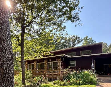 NEW LISTING!! This residence offers diverse possibilities on Cherokee Village South Course in Arkansas - for sale on GolfHomes.com, golf home, golf lot