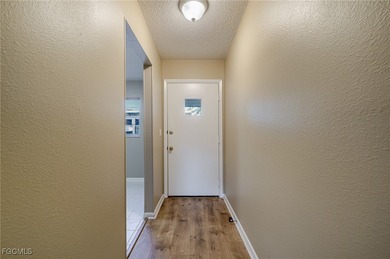 Welcome to 6869 Bogey Drive in the desirable Myerlee Gardens on Myerlee Country Club in Florida - for sale on GolfHomes.com, golf home, golf lot