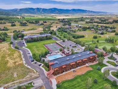 Discover a rare opportunity to own an elevated cabin lot in one on Teton Springs Resort and Club in Idaho - for sale on GolfHomes.com, golf home, golf lot