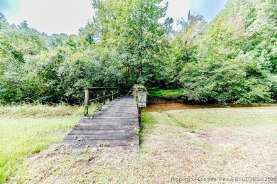 Charming 4-Bedroom Home in Carolina Trace with Unique Features! on Carolina Trace Country Club in North Carolina - for sale on GolfHomes.com, golf home, golf lot