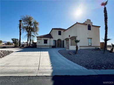This spacious 2-story custom pool home in the gated Los Lagos on Los Lagos Golf Club in Arizona - for sale on GolfHomes.com, golf home, golf lot